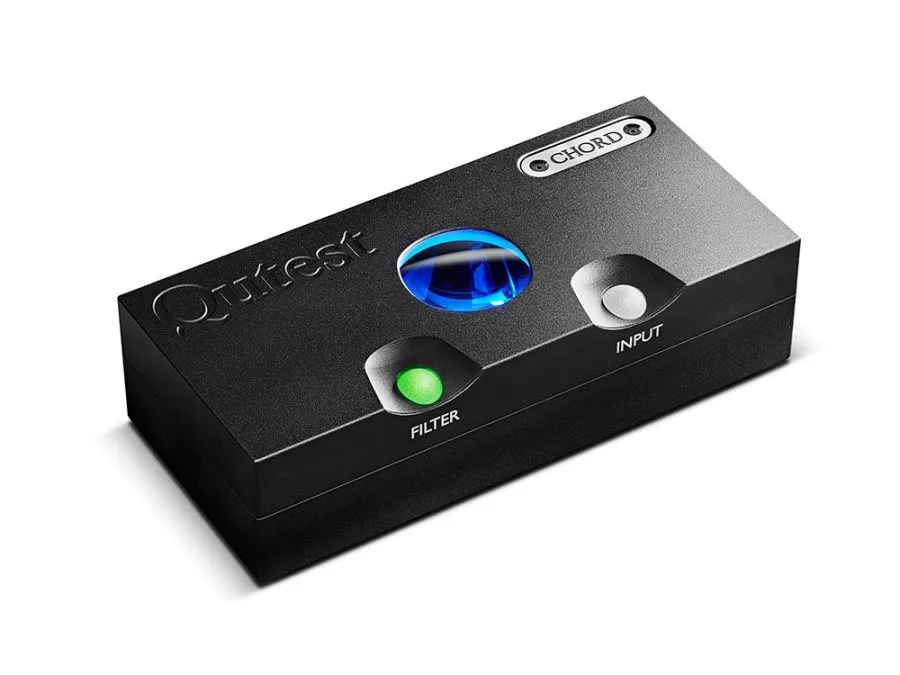 The black Qutest in three-quarter view: the engraved Qutest name, the blue-lit sample-rate window and the green FILTER and white INPUT spheres