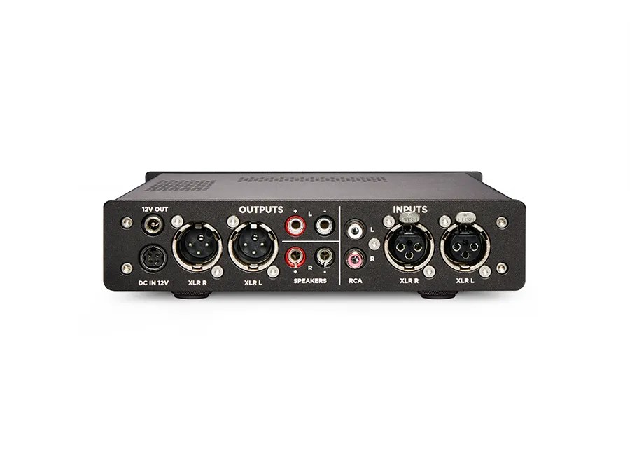 Rear of the black Alto: the 12 V DC input and 12 V output jacks, a pair of XLR outputs, red and white speaker binding posts marked SPEAKERS, the RCA inputs and a pair of XLR inputs