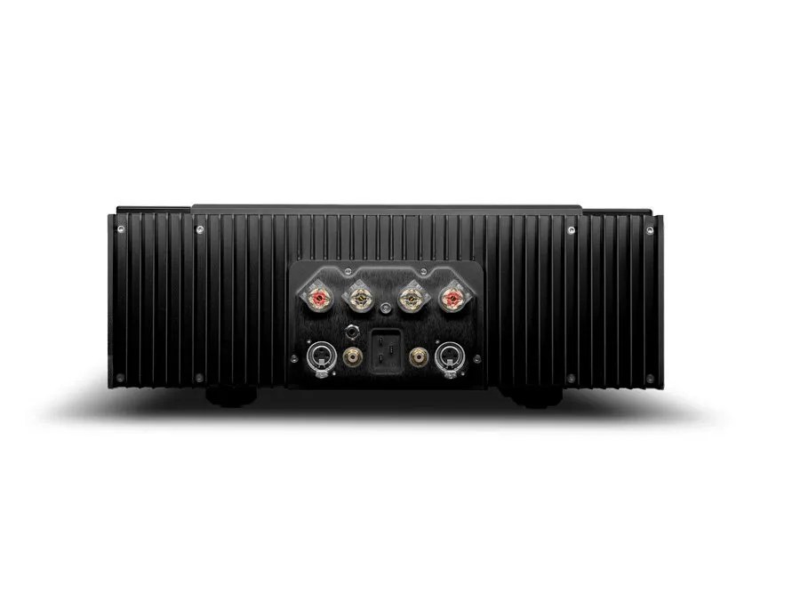 Rear of the black ULTIMA 2: the finned flanks around the terminal plate with four binding posts, balanced XLR and unbalanced RCA inputs, 12 V trigger and C-19 mains inlet