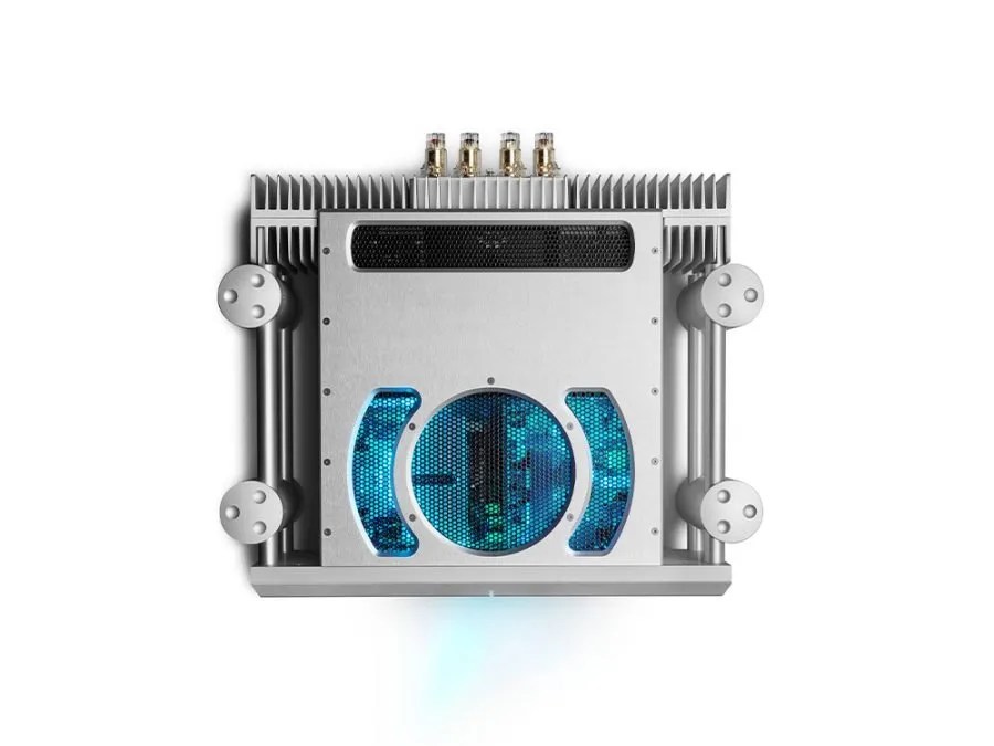 The silver ULTIMA 5 from above: the blue-lit circle and arc vent pattern, the four ball-topped Integra legs and the four gold binding posts along the rear edge