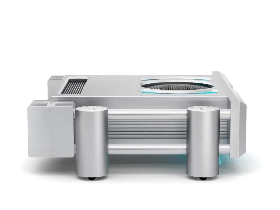 The silver ULTIMA INTEGRATED in profile: the full-width casework standing on two cylindrical Integra legs, with the round lit vent on the top panel